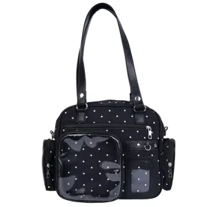 Black polka dot ita bag detail, transparent front pocket and cute star studs for daily use.