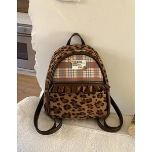 Korean retro leopard print small backpack for women, cute college style daily casual shoulder bag.
