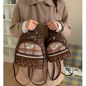 Korean vintage leopard print mini backpack for women, stylish cute school style small bag.