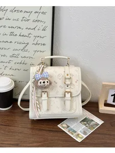 Chic vintage style women mini backpack with cute plush bear pendant and stylish print.