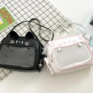 Detailed view of cute cat ear ita backpacks featuring transparent window and metal star charms.