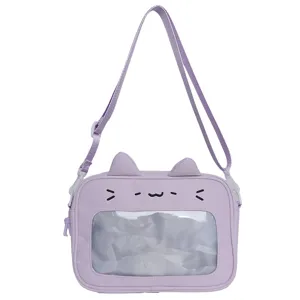 Detail view of purple cat ita bag with clear window and cute ears for pins display.