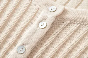 Beige ribbed knit cardigan detail shot, slim fit long sleeve crew neck sweater for women