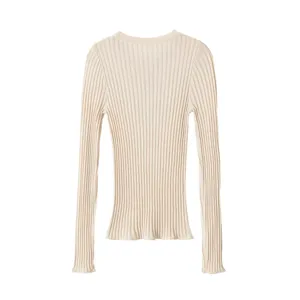 Detailed view showing the soft texture of this elegant beige long-sleeve ribbed knit sweater.