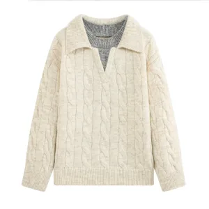 Detailed view of the stylish cable knit sweater with lapel faux two-piece design.