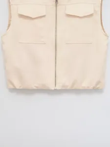 Beige casual zipper vest for women, featuring front flap pockets and stand collar detail.