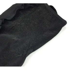 Black seamless underarm sweat pad detail, breathable knit fabric texture view close up