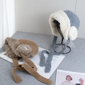 Winter thickened knit earflap hat detail shot, fleece lined warm bomber hat for women.
