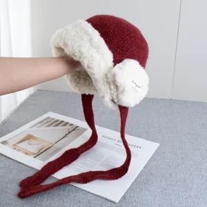 Thickened plush red earflap knit hat detail, warm winter bomber hat for women, soft cozy style.