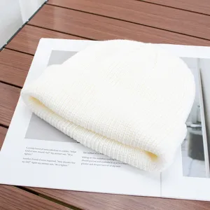 Solid white knit beanie winter warm cap, cozy skull cap for men and women, casual daily wear.