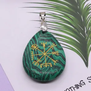 Natural stone Viking rune teardrop pendant with golden engraved compass motif jewelry accessory.
