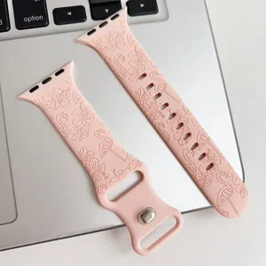 Rosa Silikon Uhrenarmband kompatibel mit Apple Watch, gravierte Blumen und Flamingos.