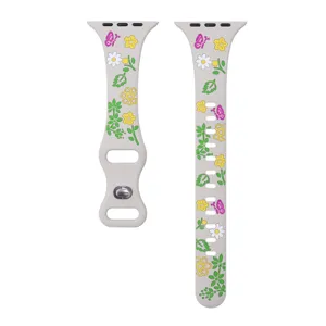 Silicone watch band compatible with Apple Watch, colorful floral pattern, soft replacement strap.