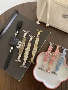 Leather watch strap compatible with Apple Watch, featuring charming star and moon metal decorations.