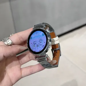 Detailed view of metal and leather smartwatch replacement strap with stylish design.