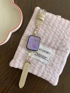Detailed view of luxury leather star and moon watch strap compatible with Apple Watch, elegant design.