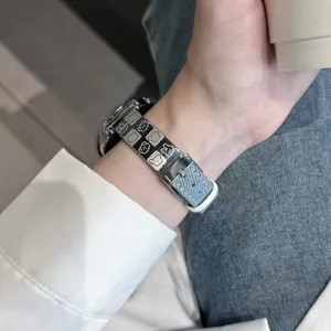 Metal and denim watch strap detail, cute bear pattern, stylish replacement accessory.