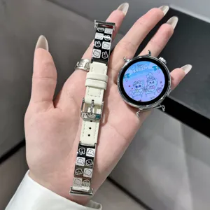 Stylish metal and leather watch strap with cute cartoon design, compatible with smartwatches.