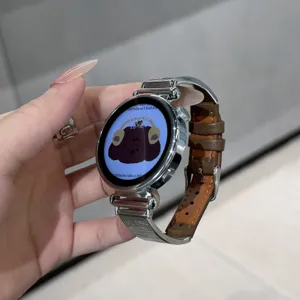 Detailed view of the metal and genuine leather smartwatch strap featuring cute puppy embossed patterns.