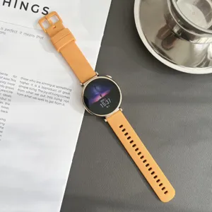 Vue détaillée du bracelet de montre en silicone orange vif pour montres connectées.