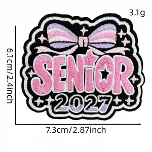 Detailed view of the 2027 graduation bow embroidery patch pink cloth badge decoration.