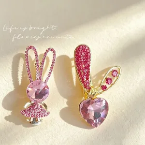 Pink rhinestone rabbit hair clips for women, cute sparkling duckbill hair accessories.