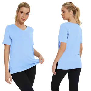 Light blue V-neck short sleeve T-shirt with side slits, loose casual women top for summer.