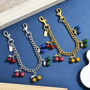 Multi-color cherry pendant metal chain bag charm sweet cool style decorative accessory.