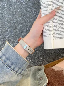 Canvas watch strap detail showcasing premium woven texture, metal buckle, and comfortable fit.