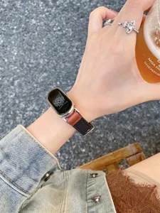 Close-up detail of stylish smartwatch canvas leather replacement strap worn on wrist outdoor style