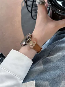 Replacement leather watch strap with rhinestone cross charm for smartwatches compatibility.