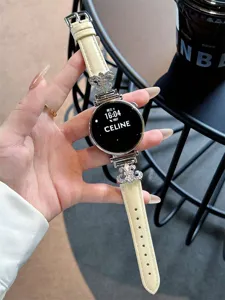 Beige leather smartwatch band with crystal connectors, stylish replacement strap.