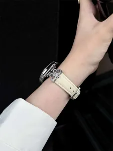 Replacement leather watch strap featuring stylish rhinestone metal buckle for smartwatches.