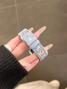 Denim embroidered dog watch band compatible with Apple Watch, stylish denim strap for smart watch.