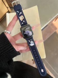 Denim embroidered watch strap detail view, cute dog pattern, compatible with Apple Watch series, stylish accessory.