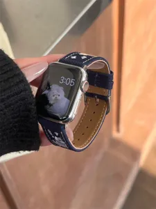 Denim embroidered dog watch band for Apple Watch, stylish and comfortable replacement strap.