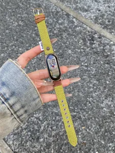 Green canvas watch strap replacement compatible with smart fitness trackers and watches.