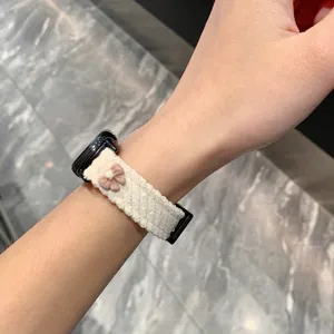 Close-up detail of cute corduroy watch strap featuring a mini bow design, soft texture.