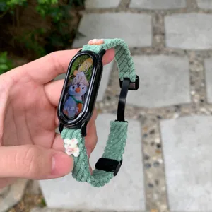 Green corduroy magnetic watch strap with cute bear charm compatible with smart fitness bands.