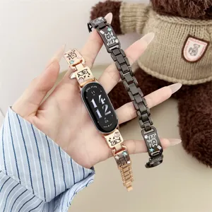 Correa de repuesto de metal para reloj inteligente con diseño de perrito tierno y pedrería.