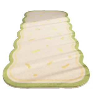 Soft fluffy long runner rug with cute green wavy edge and yellow spots for bedroom bedside.