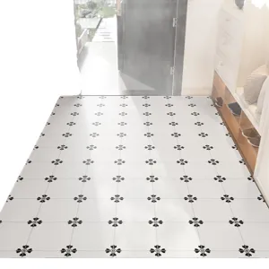 Minimalist PVC floor mat with black clover pattern, wipe-clean waterproof hallway rug.
