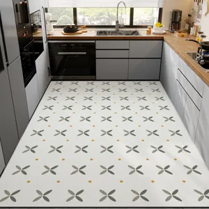 Absorbent diatomaceous earth kitchen mat detail featuring a modern floral pattern and anti-slip base.