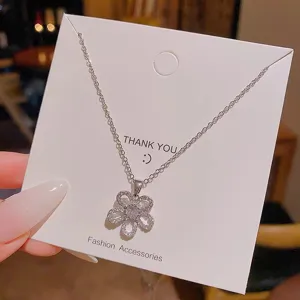 Korean style hollow flower pendant necklace, delicate silver clavicle chain for women.