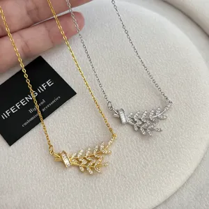 Detail view of the sparkling zircon wheat ear titanium steel necklace, delicate and elegant.