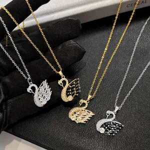 Exquisite crystal swan pendant necklace detail view, elegant titanium steel fashion jewelry.