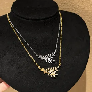 Close-up detail of the double-layer zircon wheat ear layered necklace, shiny and exquisite.