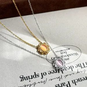 Detailed view of the French style lace cat-eye stone pendant necklace, exquisite floral frame.