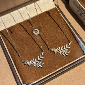 Detailed view of Korean style cubic zirconia wheat branch titanium steel necklace, elegant design.