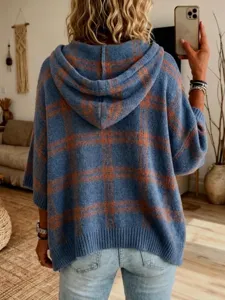 Casual women's knitted hooded plaid sweater with drawstring, loose autumn outerwear.